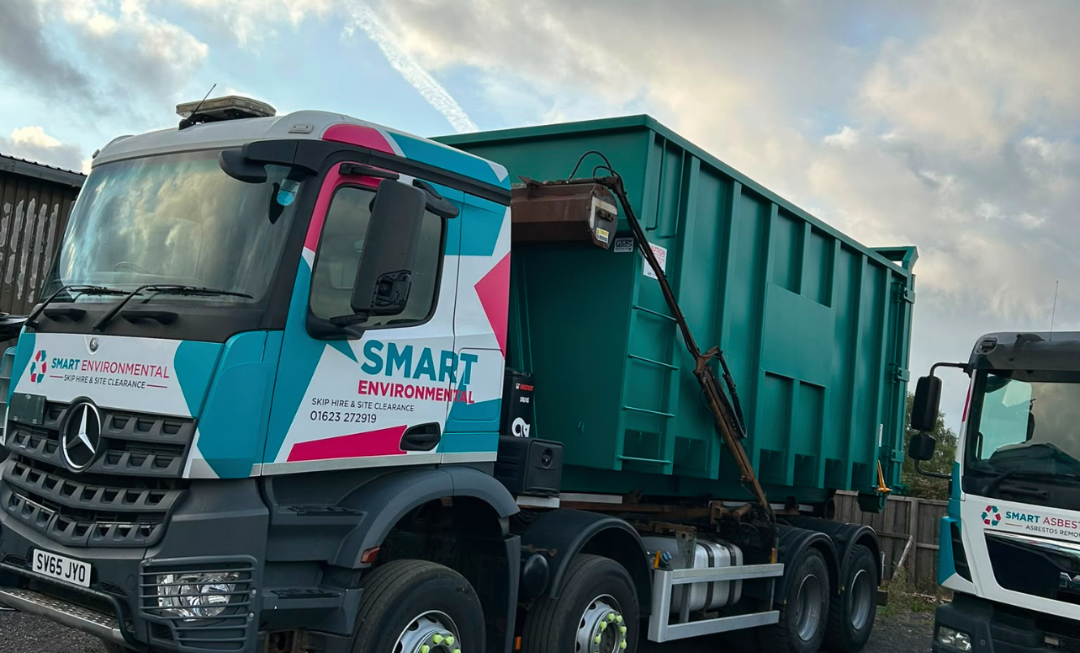 Smart Environmental RoRo skip hire lorry carrying a roll-on roll-off container.